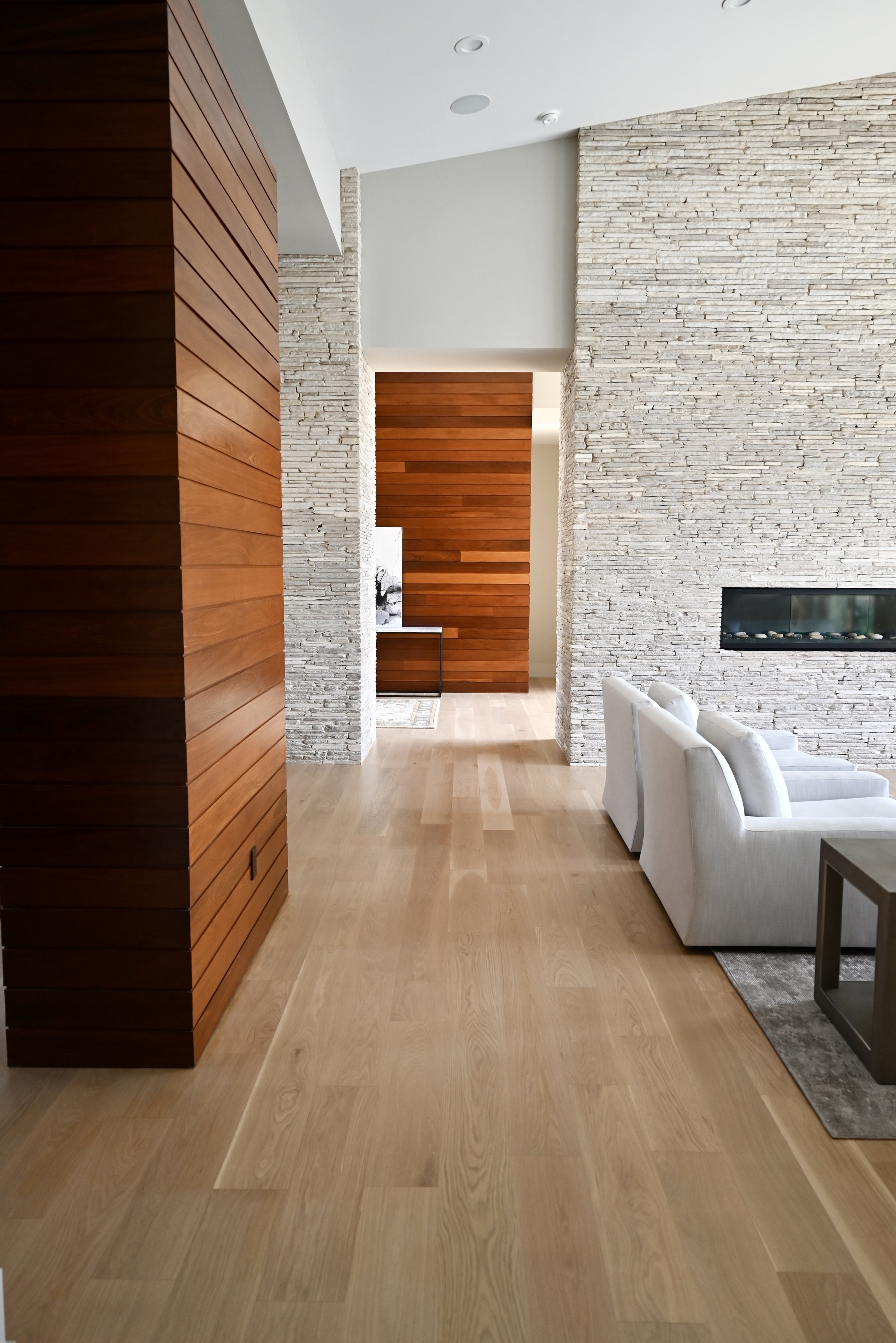 After: premium engineered hardwood installed throughout new construction Bee Cave home